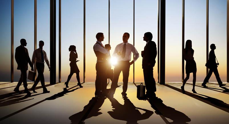 Group Of Busy Business People In The Building Interior Business professionals networking